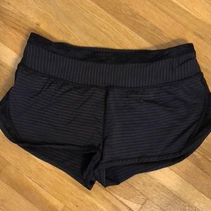 Black lululemon with gold stripe. Only worn twice!